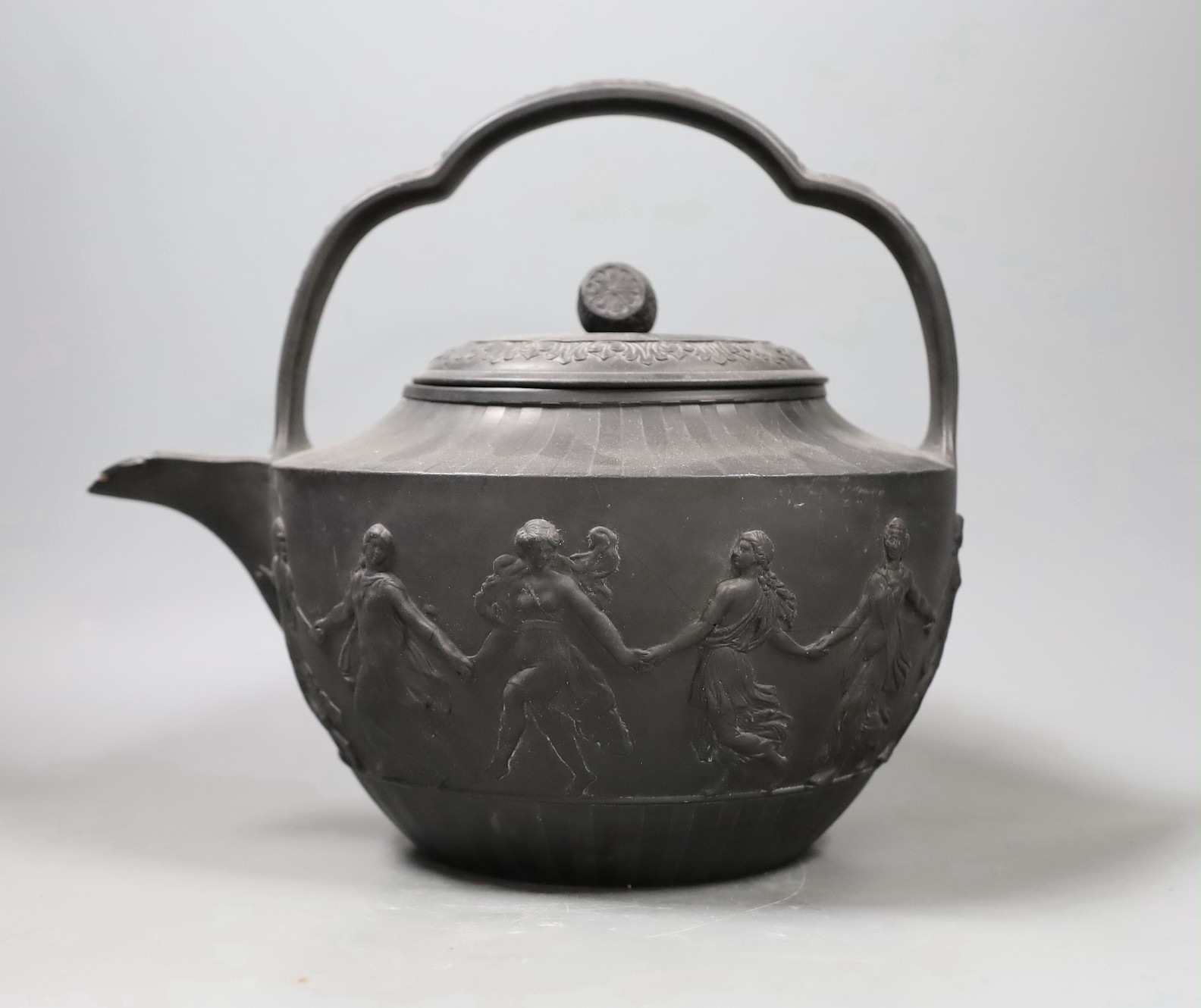 An unusually large Wedgwood black basalt teapot and associated cover, c.1800, 25cm